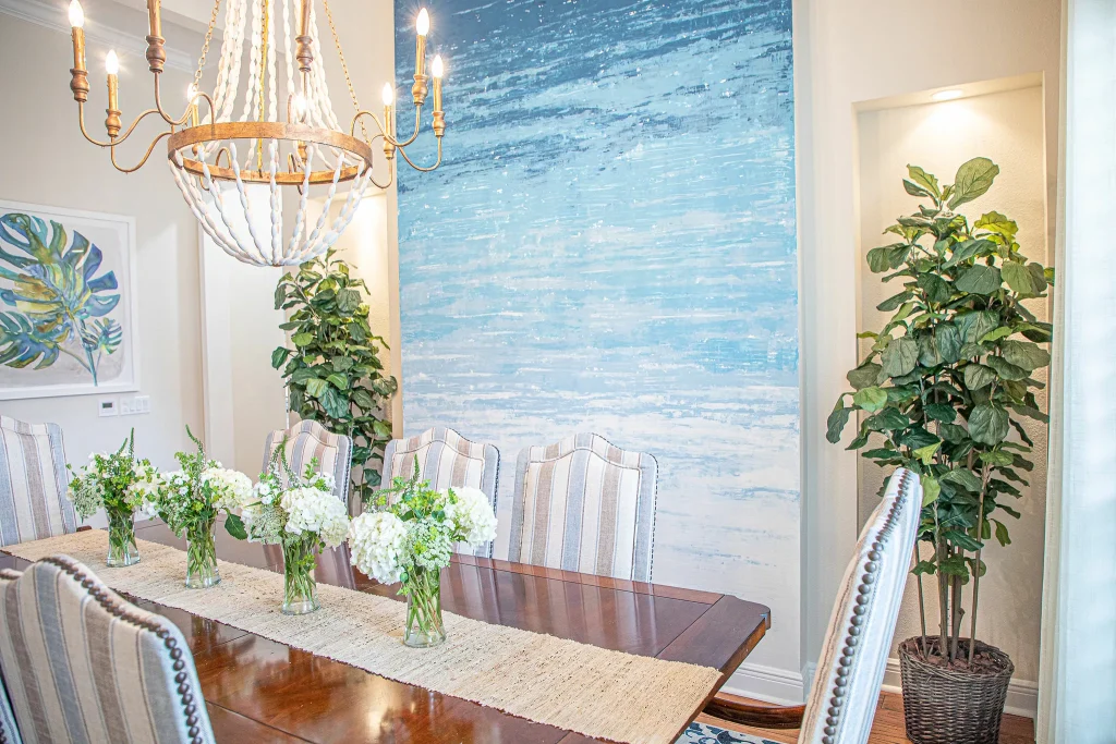 Luxury Interior Design Dining Room with Faux Fiddle Leaf Trees and Floral Center Pieces 