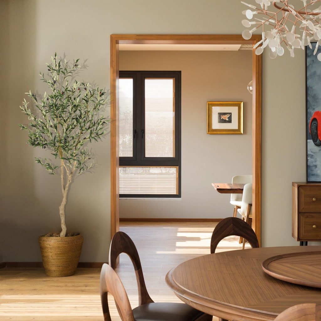 Realistic 6-foot faux olive tree with silvery-green leaves in decorative planter