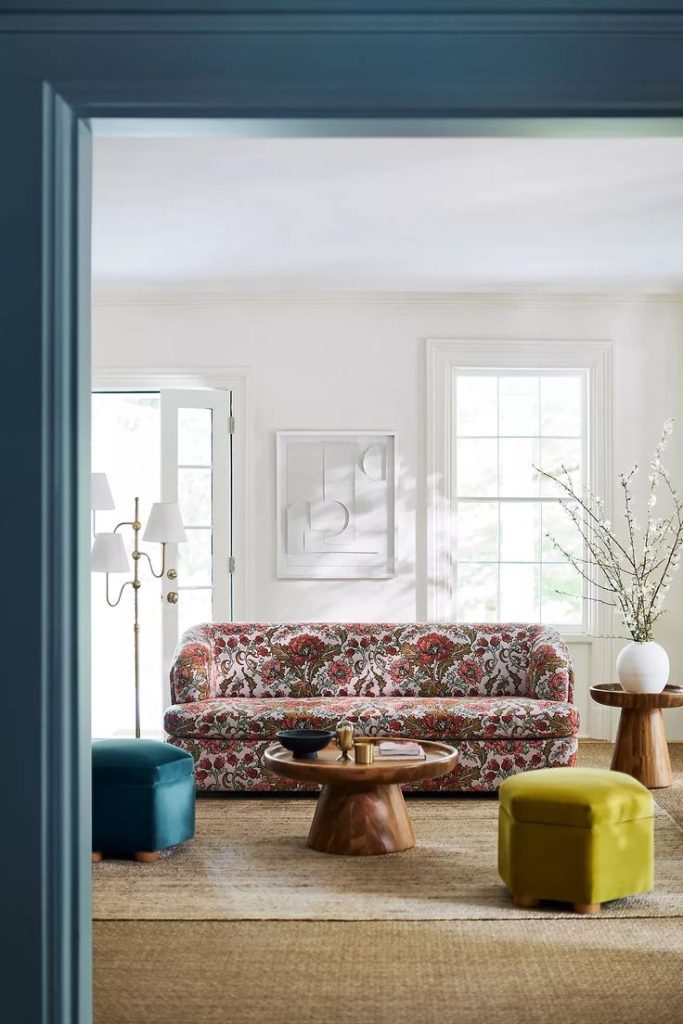 Floral patterned couch with neutral decor